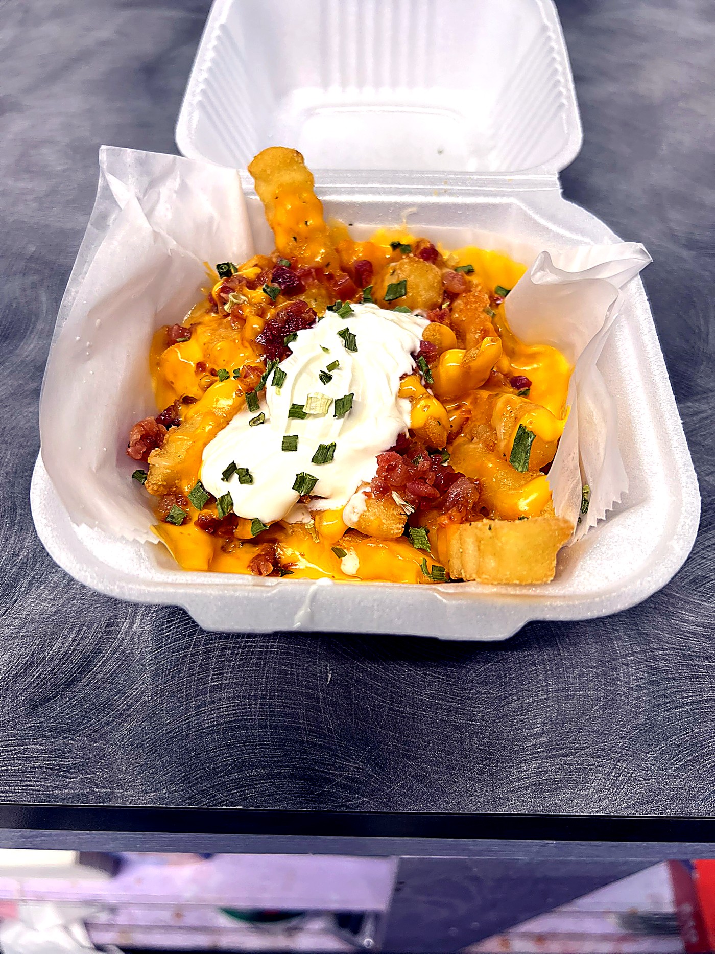 Loaded cheese fries close up