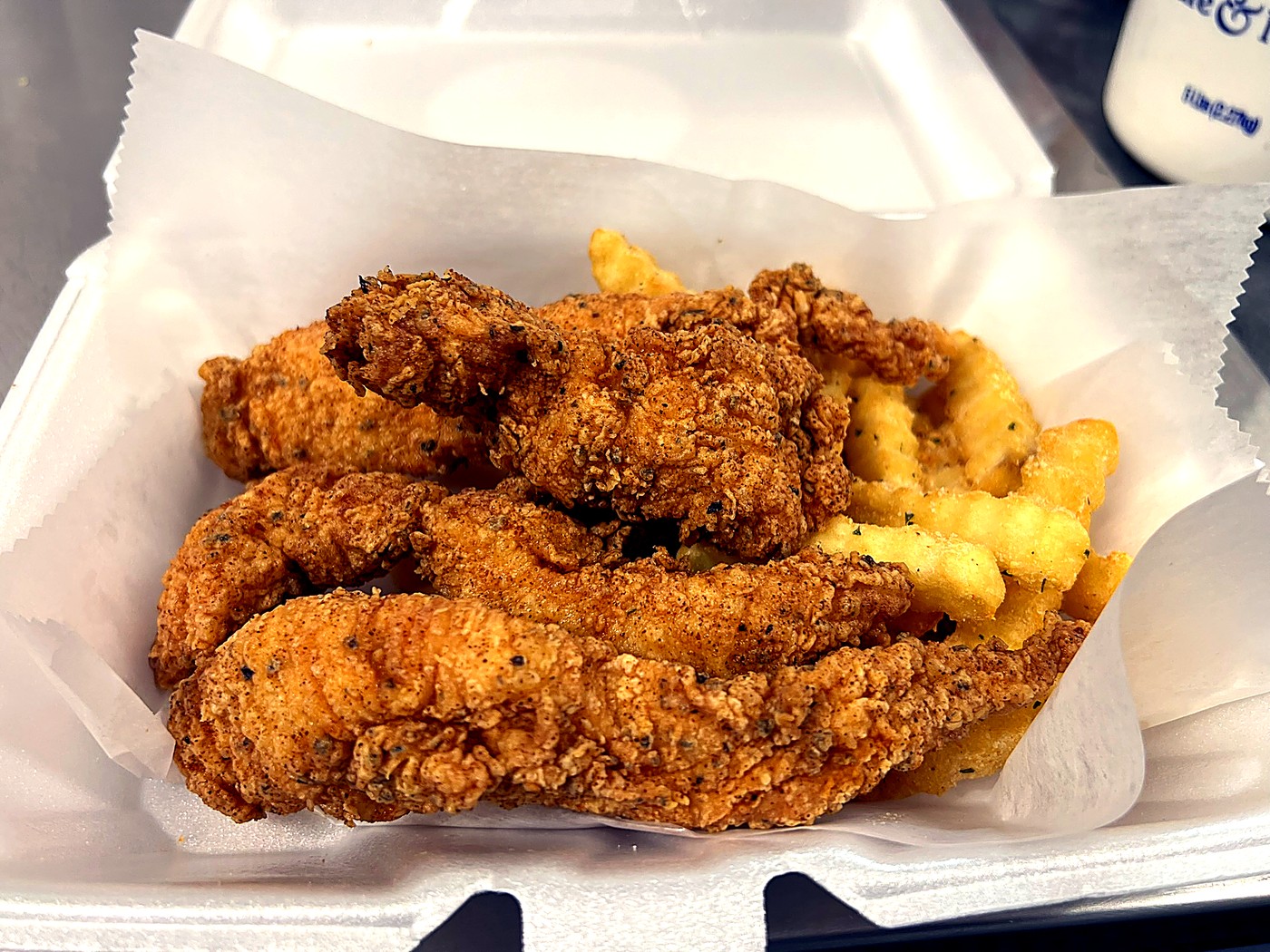 Crispy chicken tenders with fries