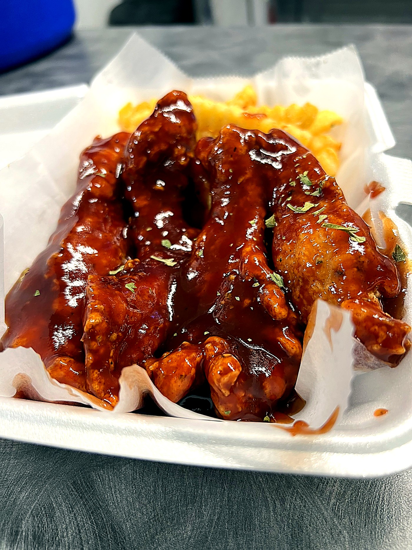 Wings tossed in BBQ sauce